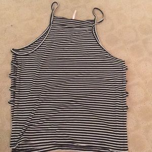 Tank with side cutouts